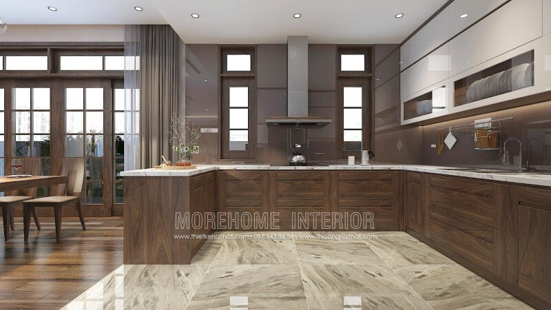 Thiết kế tủ bếp chung cư cao cấp với chất liệu gỗ óc chó nhập khẩu đóng vai trò chủ đạo tạo nên sự sang trọng, tinh tế, đồng thời thể hiện được sự đẳng cấp, gu thẩm mỹ của chủ nhân ngôi nhà Thiết kế phòng bếp, tủ bếp đẹp
