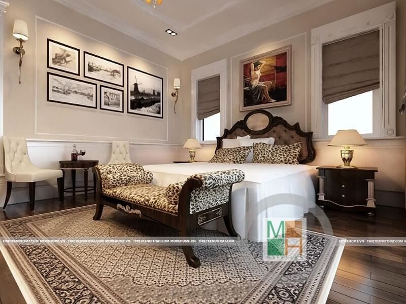 Không gian phòng ngủ được thiết kế với tone màu trắng làm chủ đạo, kết hợp với họa tiết báo tạo nên sự quyền lực và tinh tế.